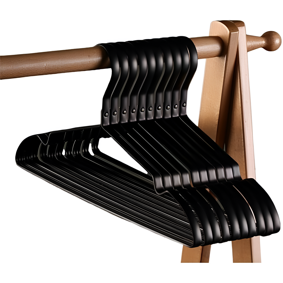 "Elegant gold and silver anti-slip clothes hangers with velvet finish, slim design, and 360° chrome swivel hook in closet."