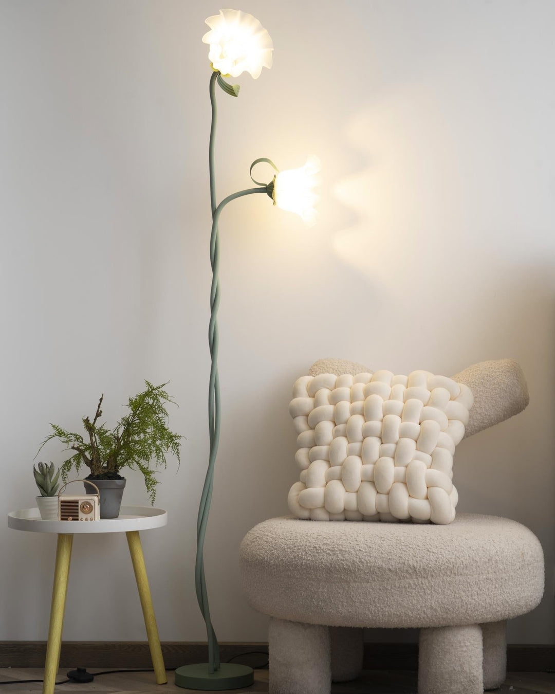 Elegant green floor lamp with white calla flower accents, matte finish, and metal construction, enhancing home decor.
