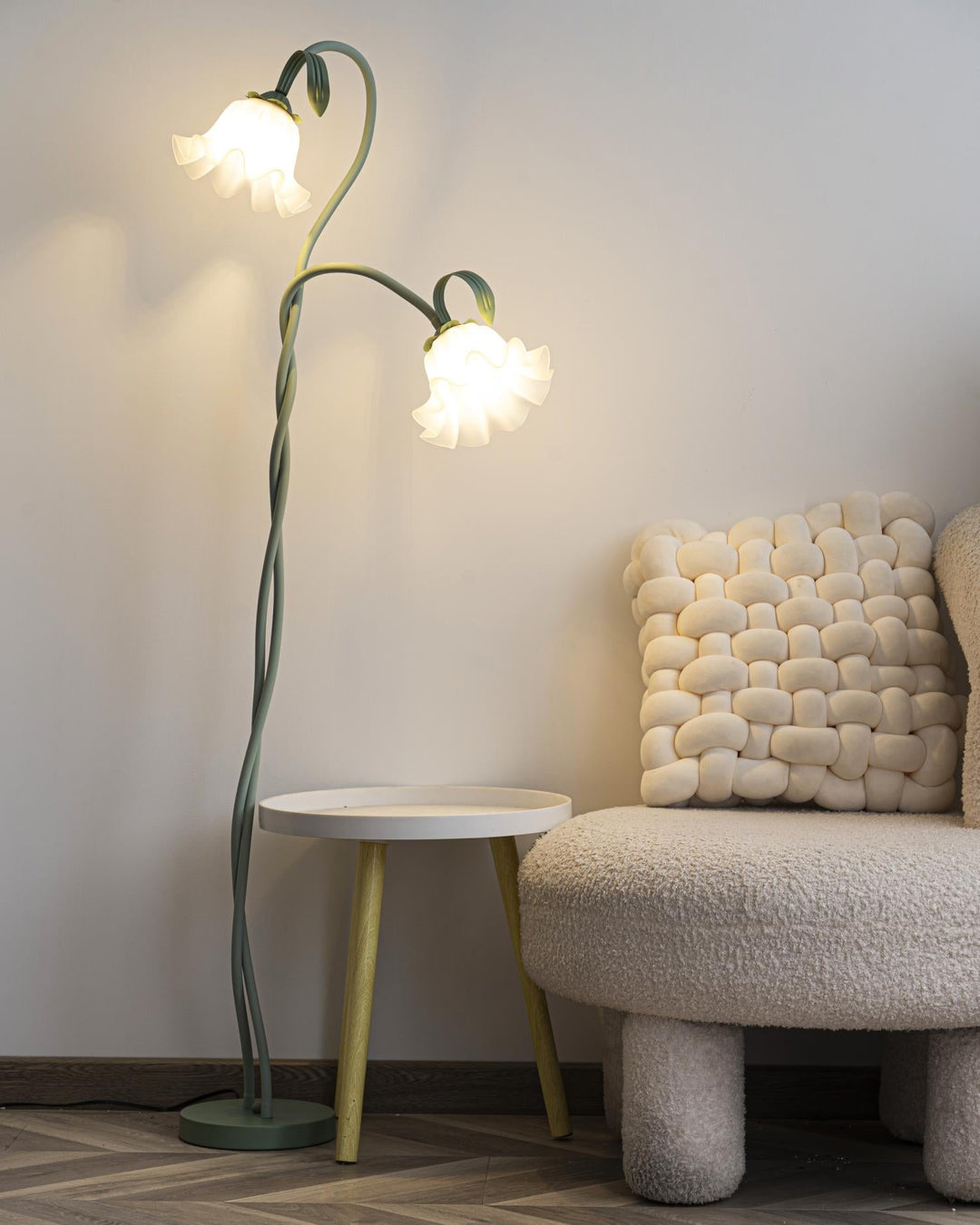 Elegant green floor lamp with white calla flower accents, matte finish, and metal construction, enhancing home decor.