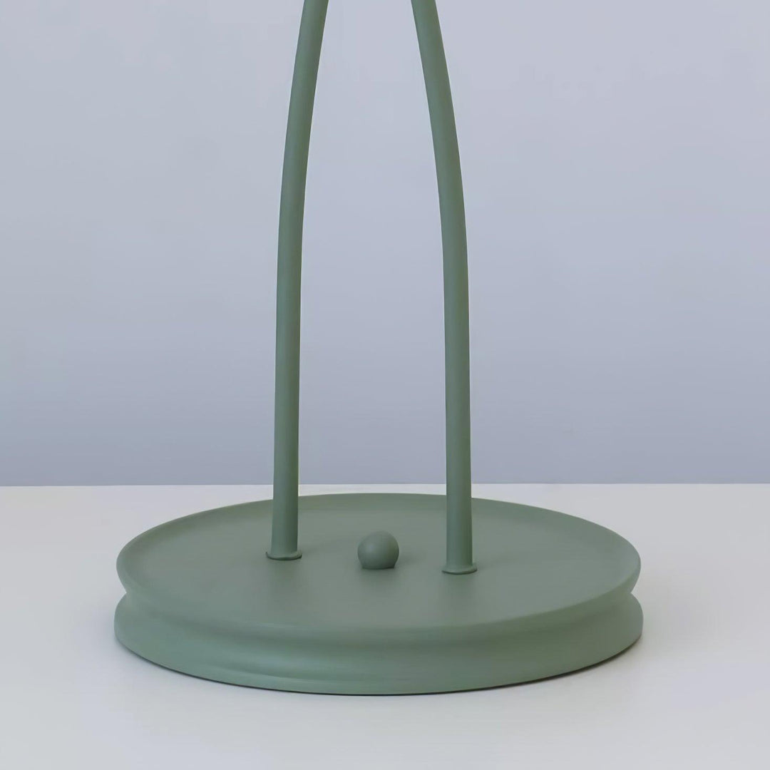 Elegant green floor lamp with white calla flower accents, matte finish, and metal construction, enhancing home decor.