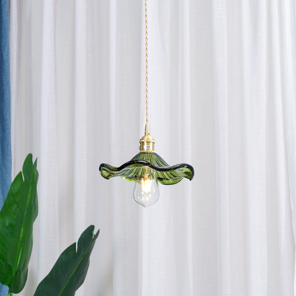 "Elegant Hibiscus Glass Pendant Light, floral design, clear and green colors, adds sophistication with ambient glow, home dec