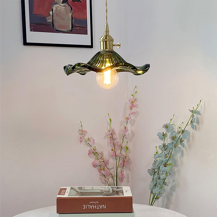"Elegant Hibiscus Glass Pendant Light, floral design, clear and green colors, adds sophistication with ambient glow, home dec