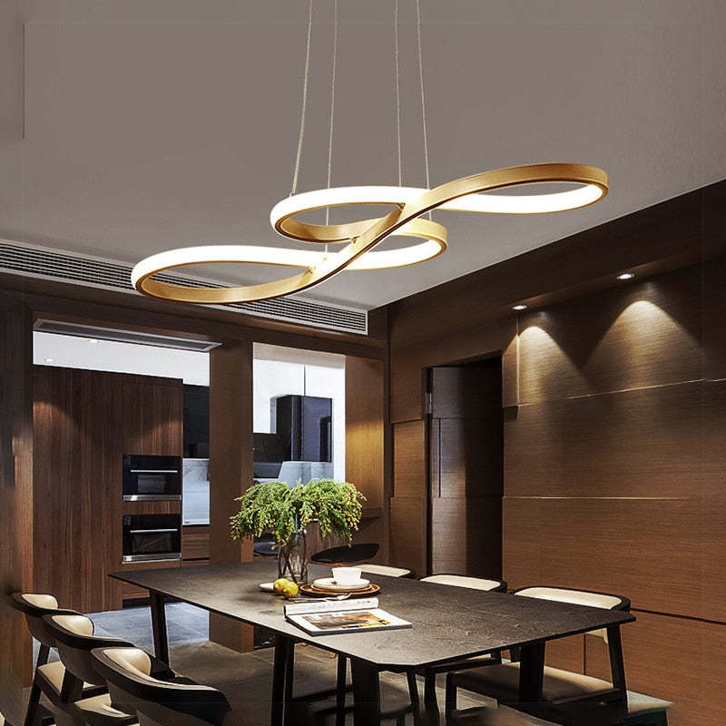 "Elegant LED pendant lamp with musical notes design in metallic black, white, and gold, creating a contemporary aesthetic."