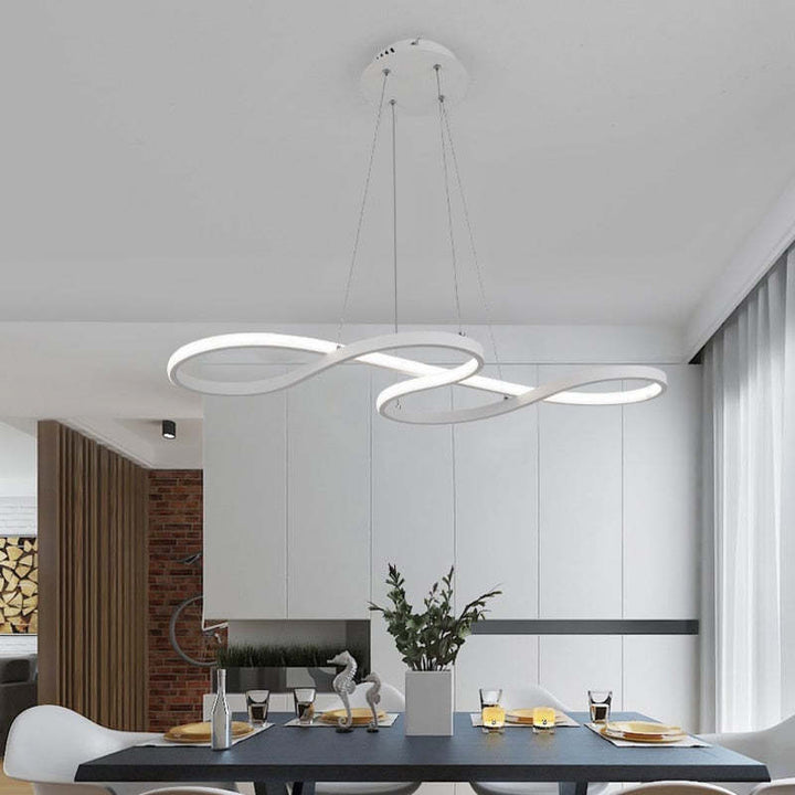 "Elegant LED pendant lamp with musical notes design in metallic black, white, and gold, creating a contemporary aesthetic."