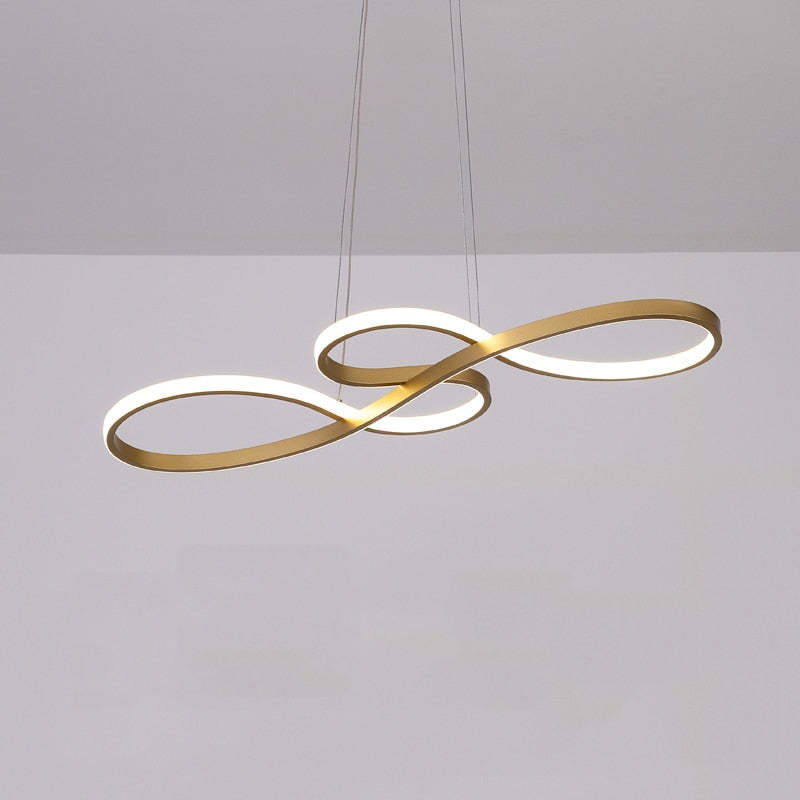 "Elegant LED pendant lamp with musical notes design in metallic black, white, and gold, creating a contemporary aesthetic."
