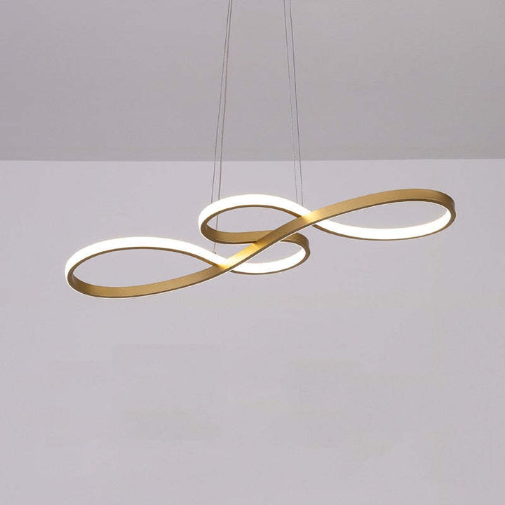 "Elegant LED pendant lamp with musical notes design in metallic black, white, and gold, creating a contemporary aesthetic."