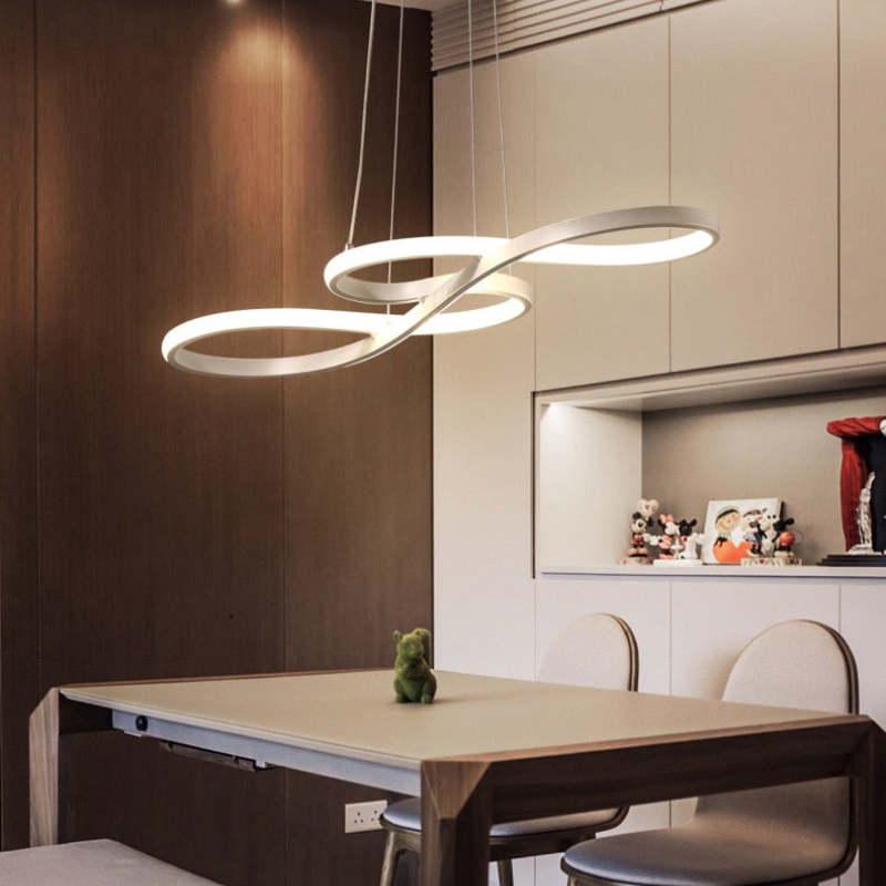 "Elegant LED pendant lamp with musical notes design in metallic black, white, and gold, creating a contemporary aesthetic."