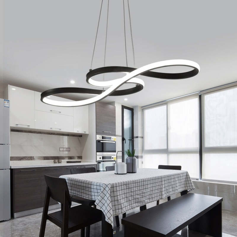 "Elegant LED pendant lamp with musical notes design in metallic black, white, and gold, creating a contemporary aesthetic."