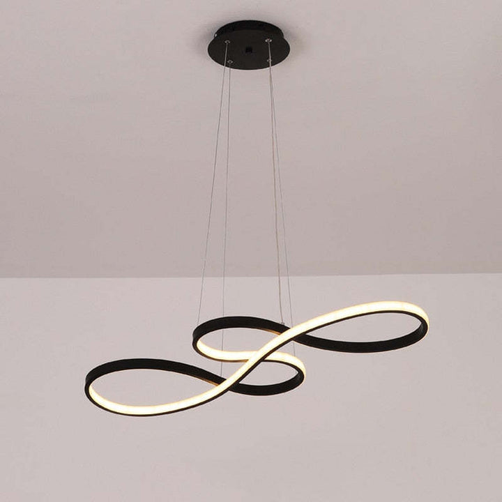 "Elegant LED pendant lamp with musical notes design in metallic black, white, and gold, creating a contemporary aesthetic."
