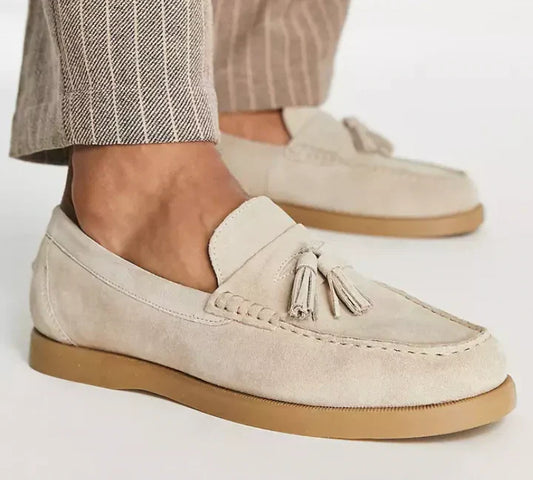 Elegant men's suede loafers with non-slip sole; versatile design; perfect for casual and formal wear; luxurious look.