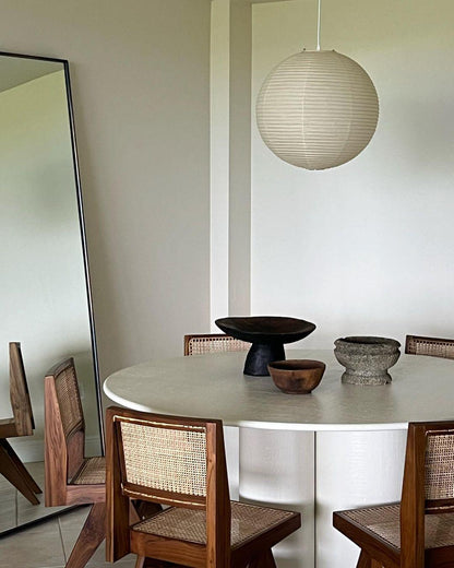 "Elegant modern Japanese paper lantern pendant light with a warm glow, blending contemporary and mid-century design."