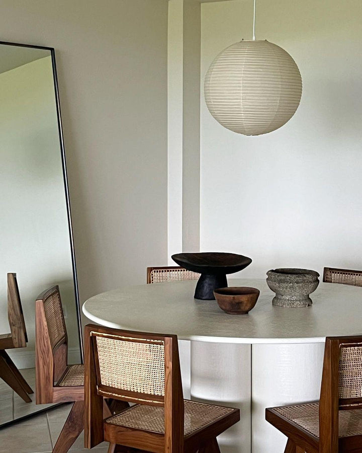 "Elegant modern Japanese paper lantern pendant light with a warm glow, blending contemporary and mid-century design."