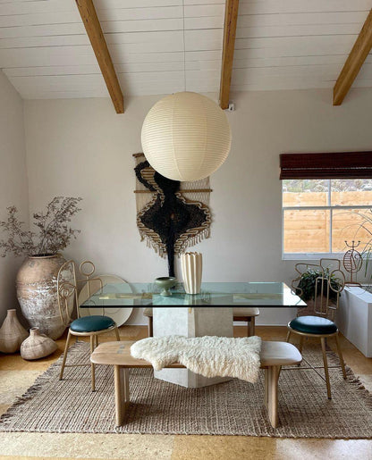 "Elegant modern Japanese paper lantern pendant light with a warm glow, blending contemporary and mid-century design."