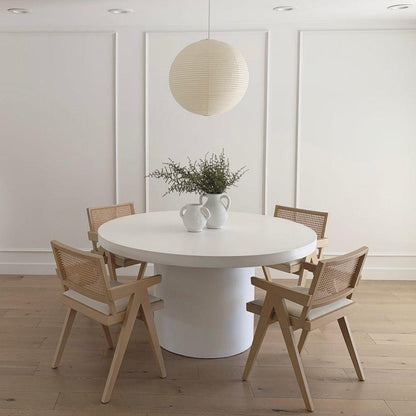 "Elegant modern Japanese paper lantern pendant light with a warm glow, blending contemporary and mid-century design."
