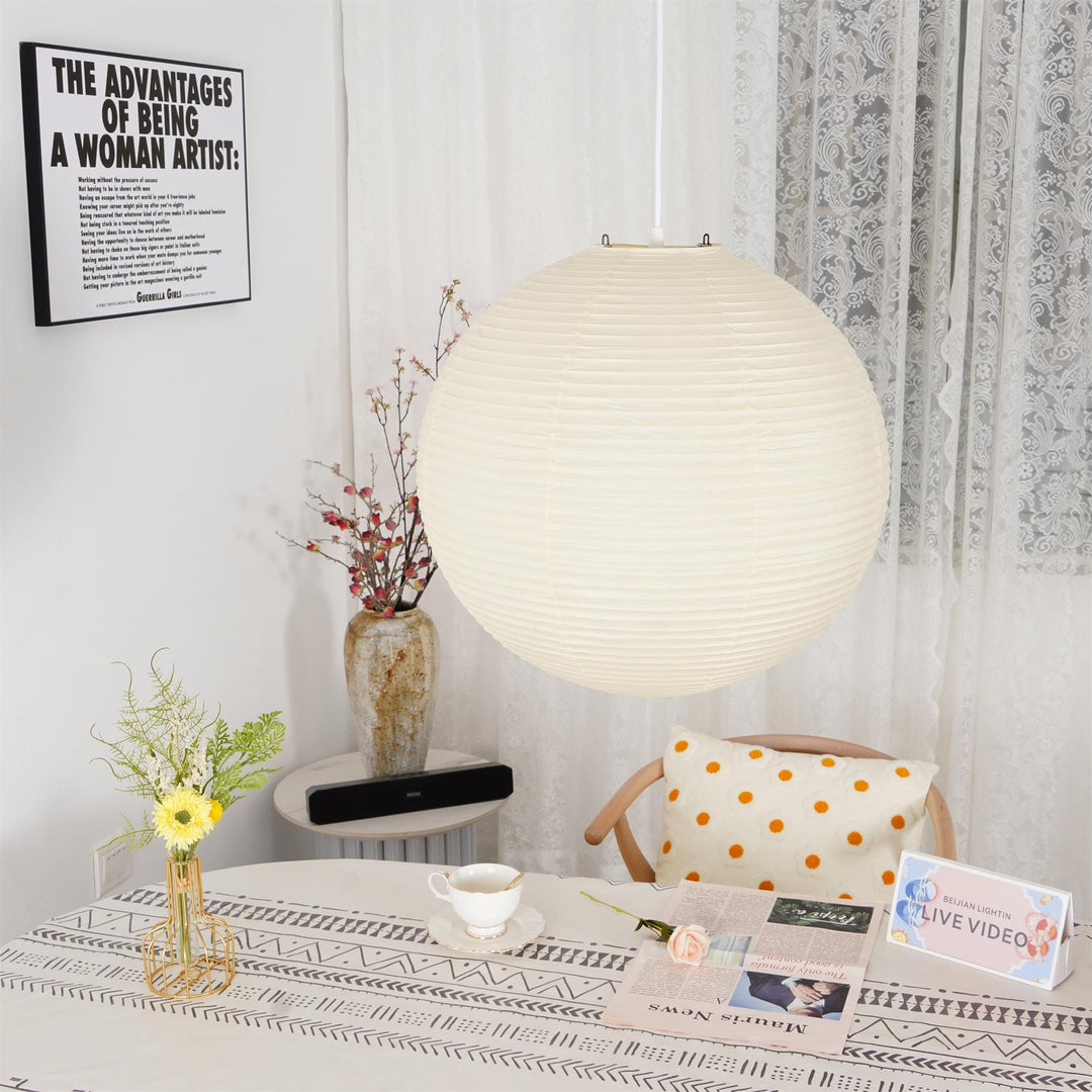 "Elegant modern Japanese paper lantern pendant light with a warm glow, blending contemporary and mid-century design."