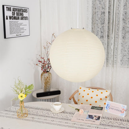 "Elegant modern Japanese paper lantern pendant light with a warm glow, blending contemporary and mid-century design."