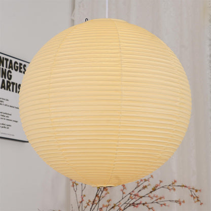 "Elegant modern Japanese paper lantern pendant light with a warm glow, blending contemporary and mid-century design."