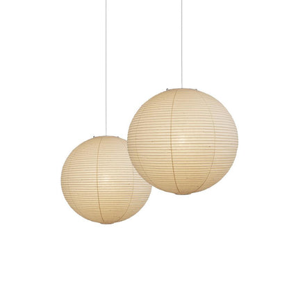 "Elegant modern Japanese paper lantern pendant light with a warm glow, blending contemporary and mid-century design."