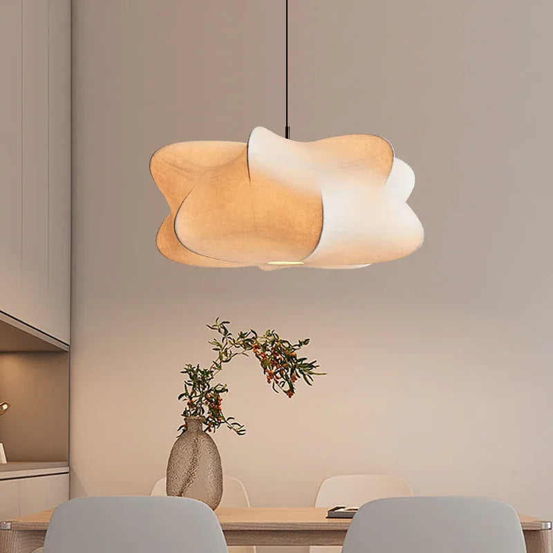 "Elegant pendant lamp with smooth silk finish, minimalist design, offering warm LED light options for modern interiors."