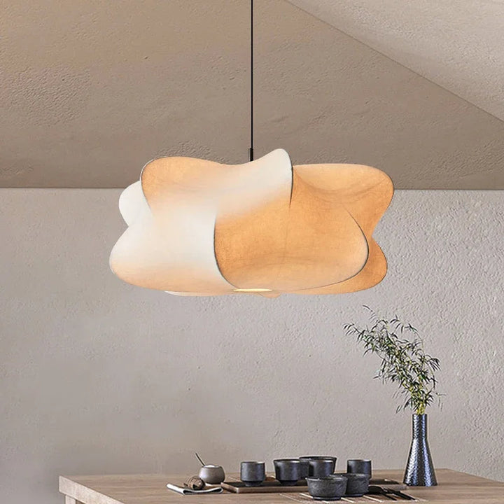 "Elegant pendant lamp with smooth silk finish, minimalist design, offering warm LED light options for modern interiors."