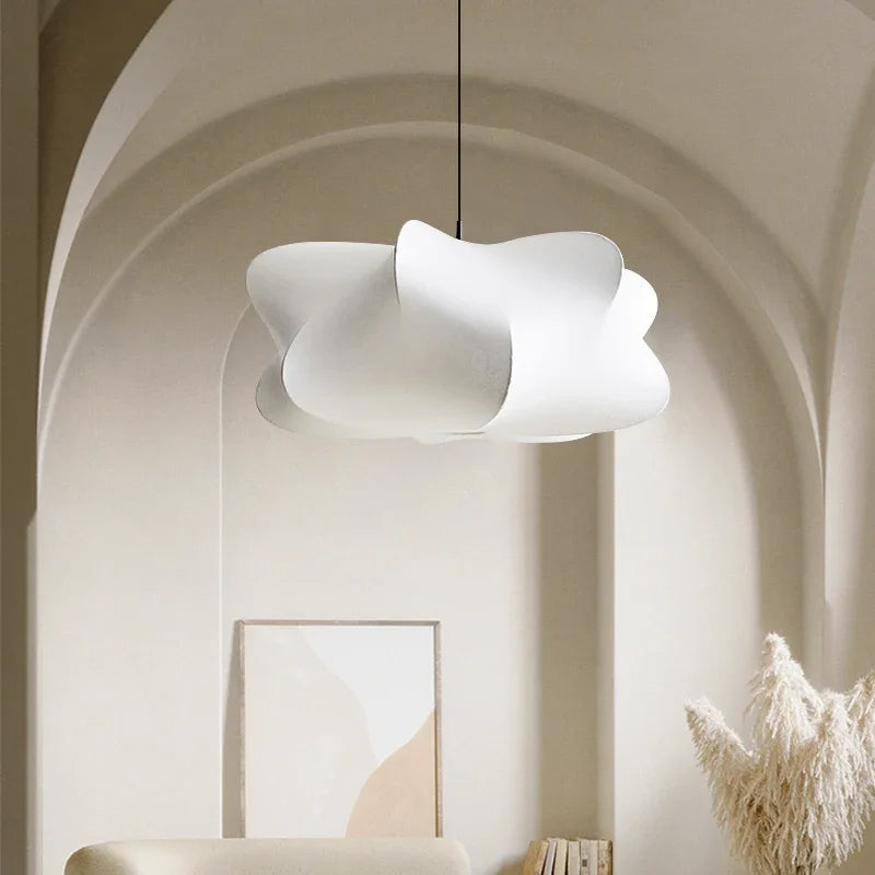 "Elegant pendant lamp with smooth silk finish, minimalist design, offering warm LED light options for modern interiors."