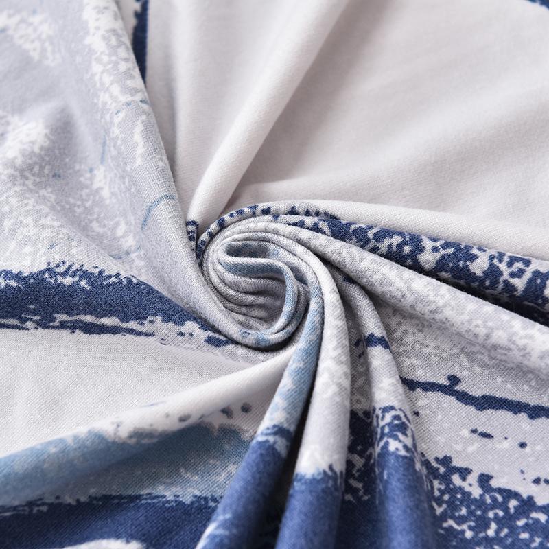 "Elegant sea-themed sofa cover for patterned sofas, offering stretch fit and protection in stylish polyester-spandex blend."