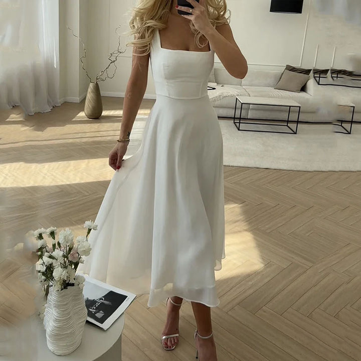 Elegant sleeveless A-line midi dress, flowy fit, square neckline, ideal for casual or formal wear, women's dresses.
