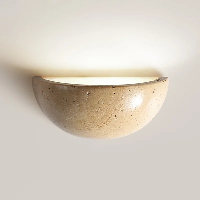 "Elegant stone-textured LED wall light, energy-efficient, modern lamp for living rooms and bedrooms with warm ambiance."