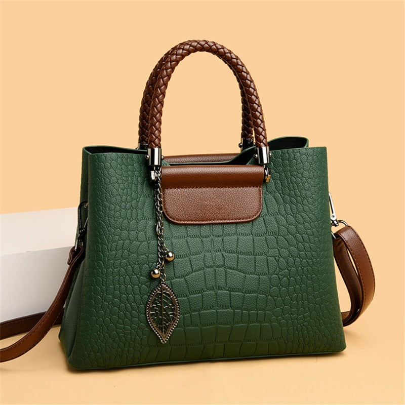 Elegant teak women's handbag with luxe design, showcasing premium craftsmanship and spacious interior in classic colors.