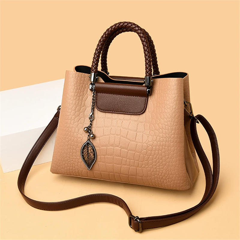 Elegant teak women's handbag with luxe design, showcasing premium craftsmanship and spacious interior in classic colors.