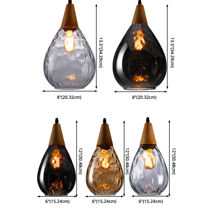 "Elegant teardrop glass pendant light with wood accents, available in clear, golden, smoky gray, perfect for any home decor."