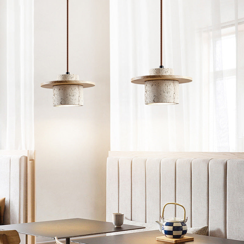 "Elegant travertine pendant light with matte finish; yellow stone, adjustable cord, retro charm, ideal for dining rooms."