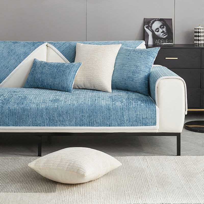 Elegant waterproof chenille sofa cover in soft hues, offering antimicrobial protection and sleek design for home decor.
