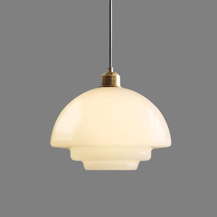 Elegant white glass pendant light with brass fixture, mid-century design, perfect for modern or classic interiors, adds luxur