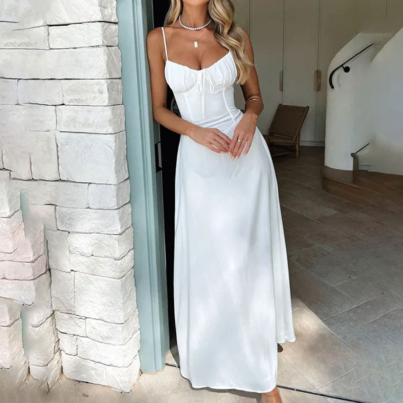 "Elegant women's A-line maxi dress with ruched bodice, satin fabric, delicate straps, ideal for special occasions."