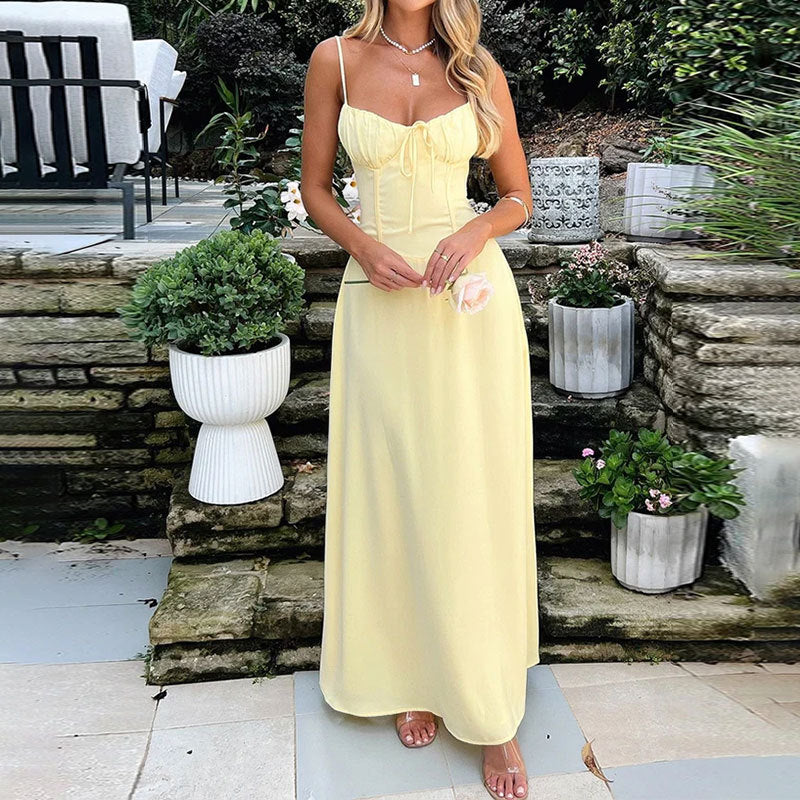 "Elegant women's A-line maxi dress with ruched bodice, satin fabric, delicate straps, ideal for special occasions."