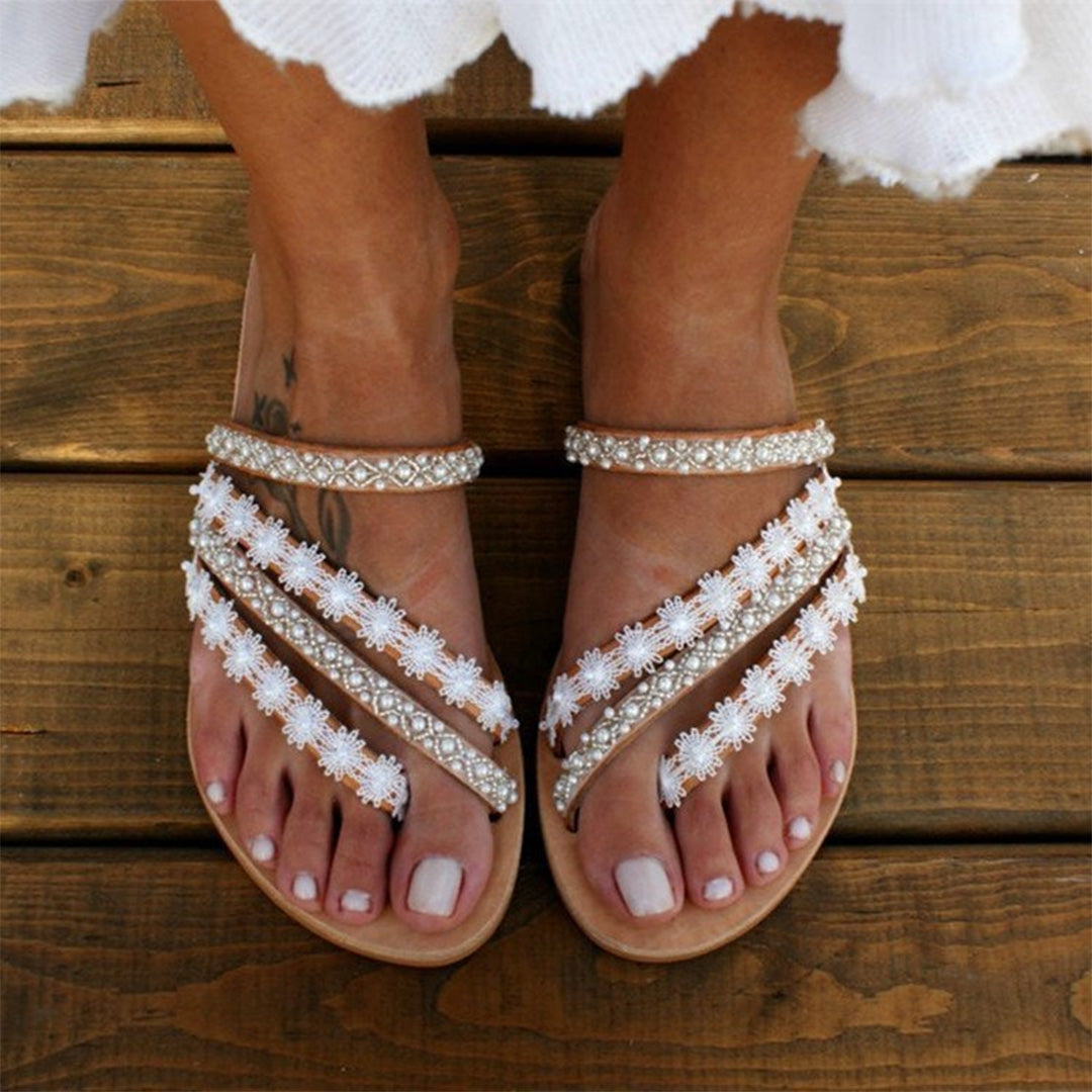 Elegant women's adjustable comfort sandals with soft sole in white and brown, featuring customizable fit and stylish design.