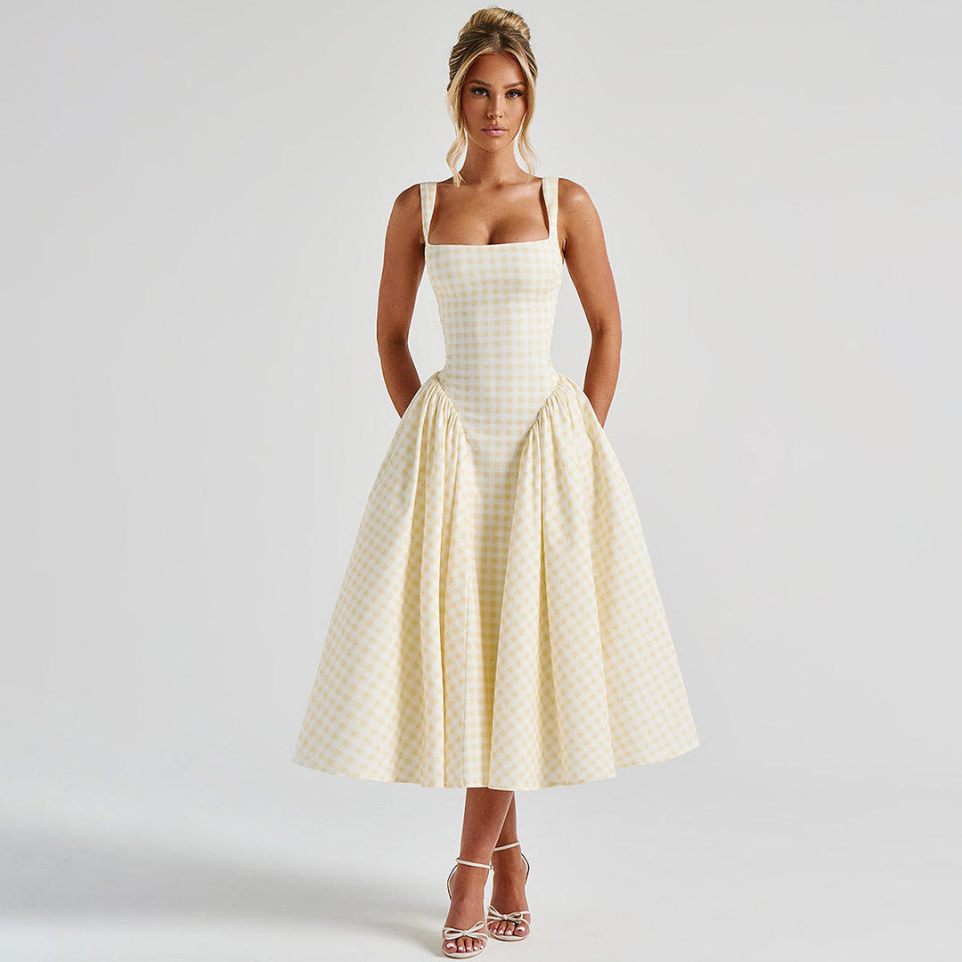 Elegant women's checkered midi dress with square neck and princess silhouette, highlighting classic charm and flattering fit.