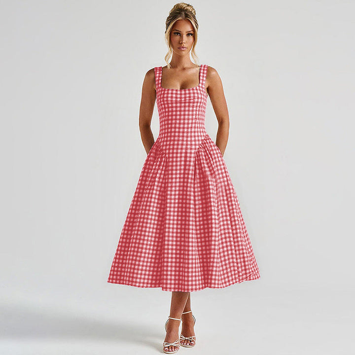 Elegant women's checkered midi dress with square neck and princess silhouette, highlighting classic charm and flattering fit.