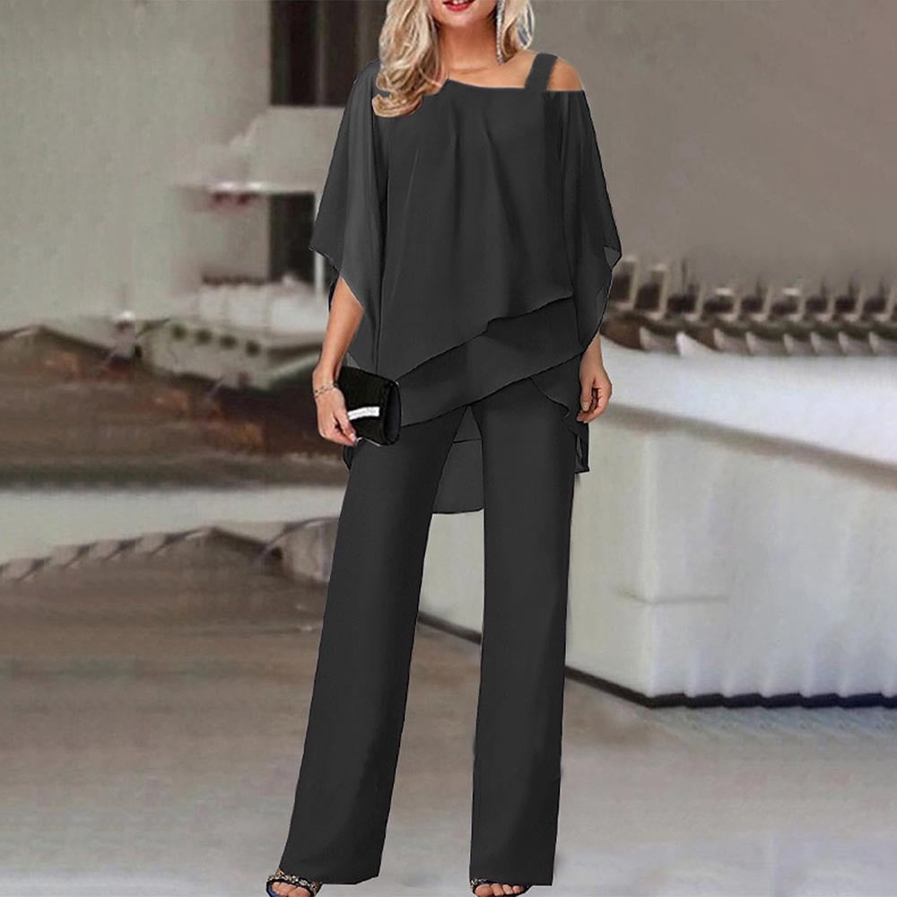 Elegant women's cold shoulder jumpsuit with flowy silhouette, featuring a chic design and flattering fit. Perfect for all occ