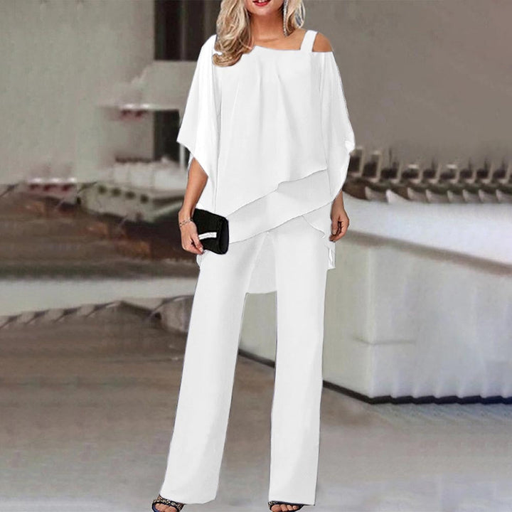 Elegant women's cold shoulder jumpsuit with flowy silhouette, featuring a chic design and flattering fit. Perfect for all occ