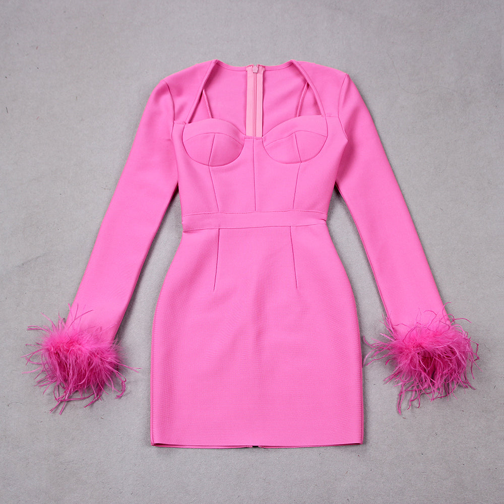 Elegant women's dress with feather details, long sleeves, and slim-fit silhouette, perfect for special occasions or evening e