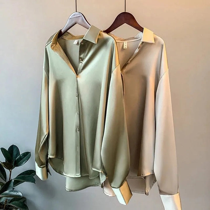 Elegant women's fall blouse in luxurious silk, soft and classic design, perfect for versatile styles and chic silhouettes.