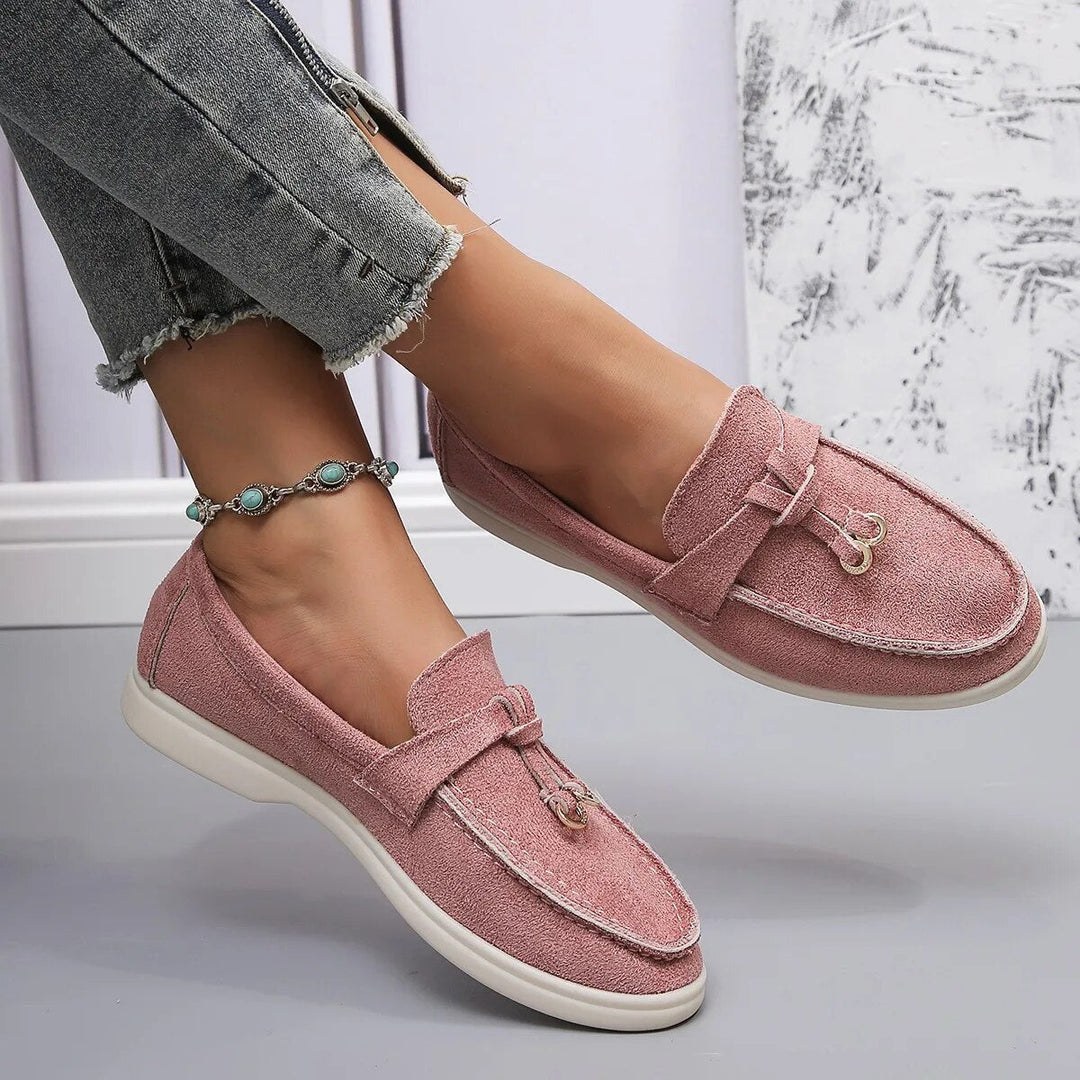Elegant women's leather loafers in smooth finish, available in various classic and vibrant colors, perfect for all occasions.