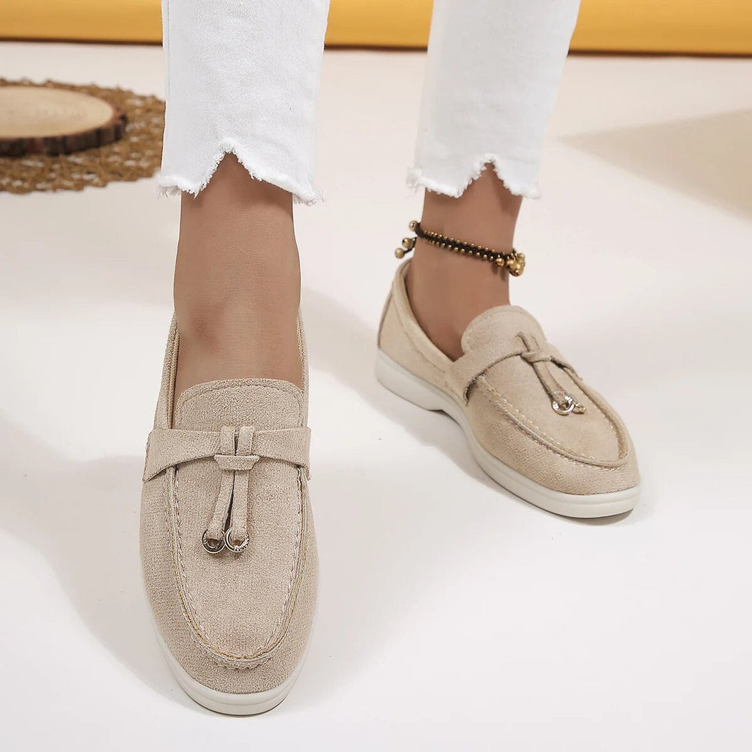 Elegant women's leather loafers in smooth finish, available in various classic and vibrant colors, perfect for all occasions.