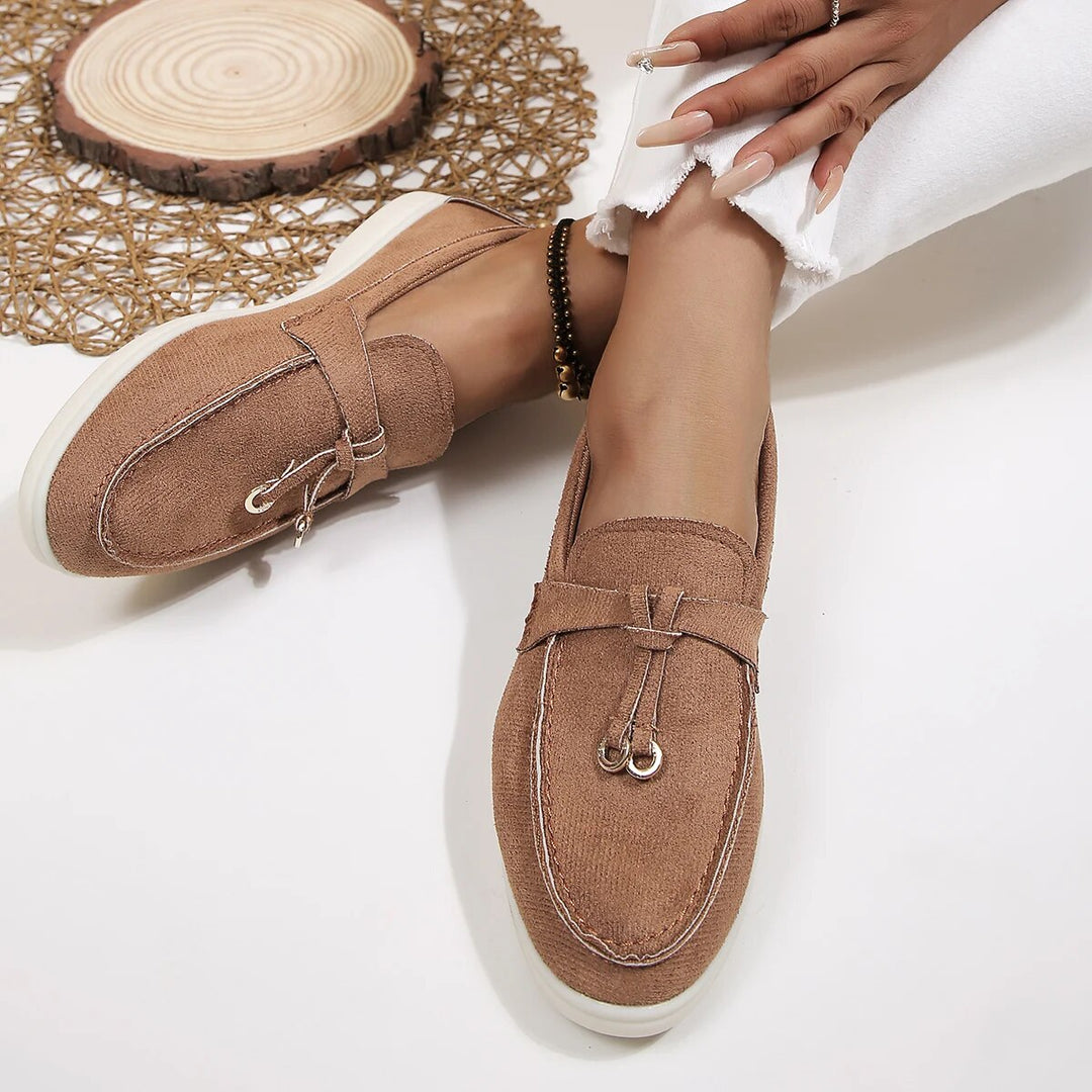 Elegant women's leather loafers in smooth finish, available in various classic and vibrant colors, perfect for all occasions.