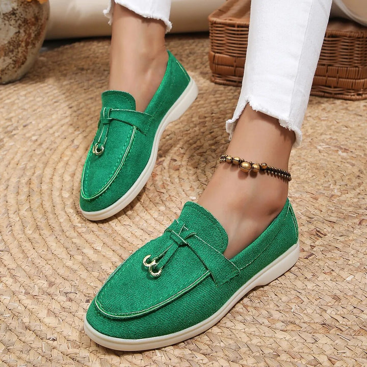 Elegant women's leather loafers in smooth finish, available in various classic and vibrant colors, perfect for all occasions.