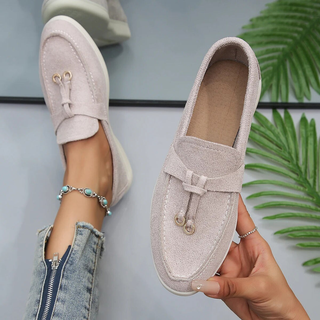 Elegant women's leather loafers in smooth finish, available in various classic and vibrant colors, perfect for all occasions.