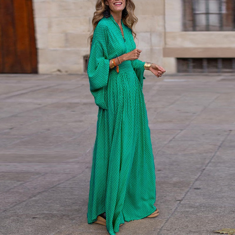 Elegant women's long sleeve V-neck midi dress in front view with defined waist and flowy hem, perfect for any occasion.