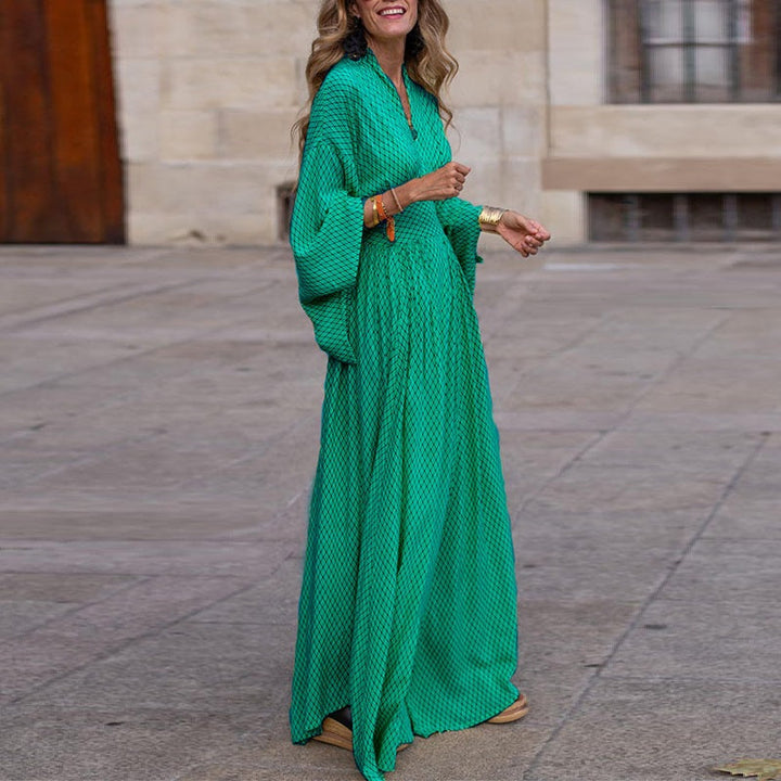 Elegant women's long sleeve V-neck midi dress in front view with defined waist and flowy hem, perfect for any occasion.